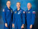 Astronauts Feustel and Arnold, and Cosmonaut Artemyev.